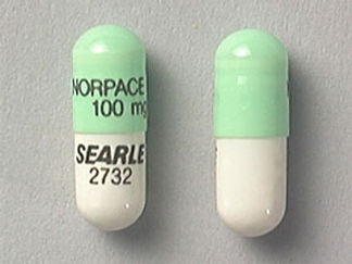 Esto es un Cápsula Er imprimido con NORPACE CR  100 mg en la parte delantera, SEARLE  2732 en la parte posterior, y es fabricado por None.