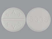 Trihexyphenidyl Hcl: This is a white round Tablet imprinted with DAN  DAN on the front, 5335 on the back, and is manufactured by ACTAVIS/TEVA.
