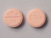 Amoxapine: This is a Tablet imprinted with DAN  50 on the front, 5714 on the back.