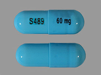 This is a Capsule imprinted with S489 on the front, 60 mg on the back.