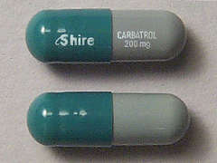 This is a gray oblong Capsule Er Multiphase 12hr imprinted with Shire on the front, CARBATROL  200 mg on the back, and is manufactured by SHIRE US INC..
