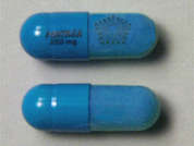 Pentasa: Esto es un Cápsula LP azul oblongo imprimido con PENTASA  500mg en la parte delantera, logo en la parte posterior, y es fabricado por SHIRE US INC..