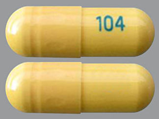 This is a Capsule imprinted with 104 on the front, nothing on the back.