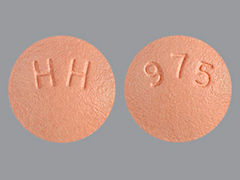 This is a Tablet imprinted with 975 on the front, HH on the back.