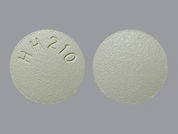 Donepezil Hcl: This is a Tablet imprinted with HH210 on the front, nothing on the back.