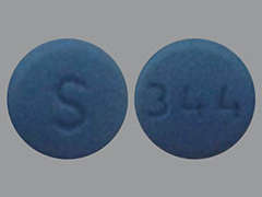 Esto es un Tableta azul redondo imprimido con S en la parte delantera, 344 en la parte posterior, y es fabricado por SOLCO HEALTHCAR.