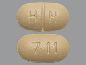 Paroxetine Hcl: This is a Tablet imprinted with 7 11 on the front, H H on the back.