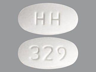 This is a Tablet imprinted with HH on the front, 329 on the back.
