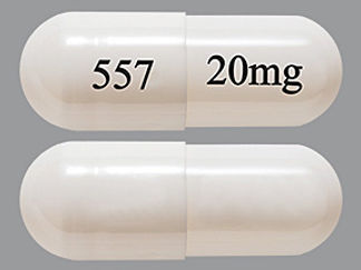 This is a Capsule Dr imprinted with 557 on the front, 20mg on the back.