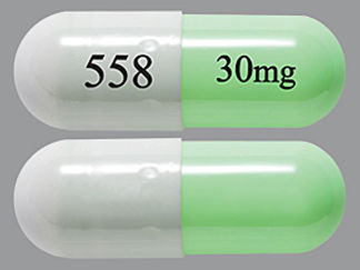 This is a Capsule Dr imprinted with 558 on the front, 30mg on the back.