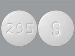 Esto es un Tableta blanco redondo imprimido con 295 en la parte delantera, S en la parte posterior, y es fabricado por SOLCO HEALTHCAR.