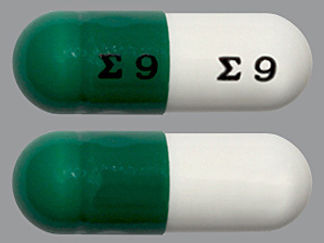 This is a Capsule imprinted with logo and 9 on the front, logo and 9 on the back.