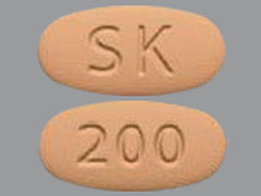 Esto es un Tableta naranja claro oval imprimido con SK en la parte delantera, 200 en la parte posterior, y es fabricado por SK LIFE SCIENCE.