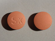 Xifaxan: This is a pink round Tablet imprinted with SX on the front, nothing on the back, and is manufactured by SALIX PHARMACEU.