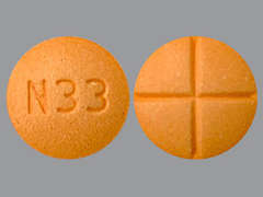 This is a peach round Tablet imprinted with N33 on the front, nothing on the back, and is manufactured by SUNRISE PHARMAC.