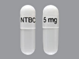 Esto es un Cápsula imprimido con NTBC 5 mg en la parte delantera, nada en la parte posterior, y es fabricado por None.