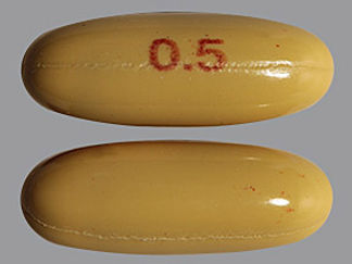This is a Capsule imprinted with 0.5 on the front, nothing on the back.