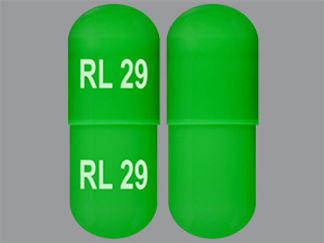 This is a Capsule imprinted with RL 29 on the front, RL 29 on the back.