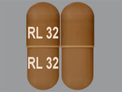 Absorica Ld: This is a Capsule imprinted with RL 32 on the front, RL 32 on the back.