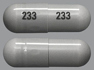 This is a Capsule imprinted with 233 on the front, 233 on the back.