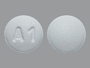 Anastrozole: This is a Tablet imprinted with A1 on the front, nothing on the back.