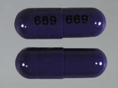 This is a purple oblong Capsule Er 24hr imprinted with 669 on the front, 669 on the back, and is manufactured by SUN PHARMA GLOB.