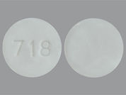 Levonorgestrel: Esto es un Tableta imprimido con 718 en la parte delantera, nada en la parte posterior, y es fabricado por None.