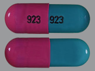 This is a Capsule Dr imprinted with 923 on the front, 923 on the back.