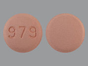 Zolmitriptan: Esto es un Tableta imprimido con 979 en la parte delantera, nada en la parte posterior.