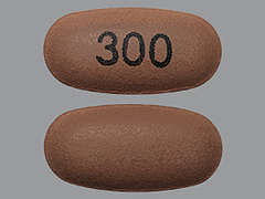 Esto es un Tableta LP 24 Hr color café oval imprimido con 300 en la parte delantera, nada en la parte posterior, y es fabricado por AJANTA PHARMA L.