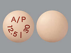 This is a pale peach round Tablet imprinted with A/P  12.5 / 30 on the front, nothing on the back, and is manufactured by PERRIGO/PADAGIS.