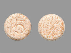 This is a Tablet Disintegrating Dr imprinted with 15 on the front, nothing on the back.