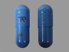 This is a blue oblong Capsule Dr Biphasic imprinted with TAP on the front, 60 on the back, and is manufactured by TAKEDA PHARMACE.