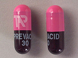 This is a Capsule Dr imprinted with TAP on the front, PREVACID  30 on the back.