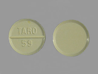 This is a Tablet imprinted with TARO  59 on the front, nothing on the back.