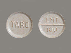 This is a light peach round Tablet imprinted with TARO on the front, LMT  100 on the back, and is manufactured by TARO PHARM USA.