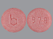 Loestrin: Esto es un Tableta imprimido con b en la parte delantera, 978 en la parte posterior, y es fabricado por None.