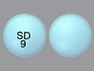 Esto es un Tableta imprimido con SD  9 en la parte delantera, nada en la parte posterior, y es fabricado por None.