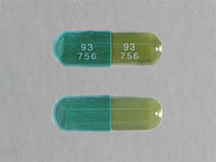 This is a dark green oblong Capsule imprinted with 93  756 on the front, 93  756 on the back, and is manufactured by TEVA USA.