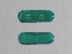 This is a dark green oblong Capsule imprinted with 93  757 on the front, 93  757 on the back, and is manufactured by TEVA USA.