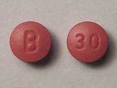 Esto es un Tableta LP 24 Hr marrón rojizo redondo imprimido con B en la parte delantera, 30 en la parte posterior, y es fabricado por OCEANSIDE PHARM.