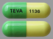 Acitretin: This is a Capsule imprinted with TEVA on the front, 1136 on the back.