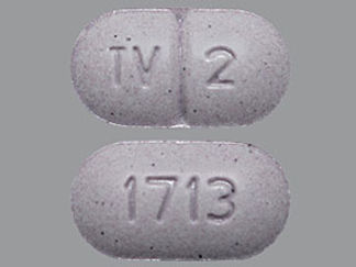 This is a Tablet imprinted with TV 2 on the front, 1713 on the back.