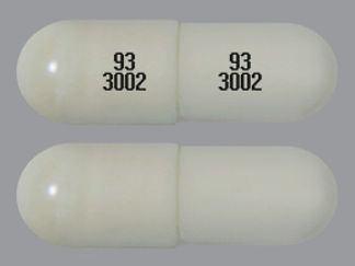 This is a Capsule imprinted with 93  3002 on the front, 93  3002 on the back.