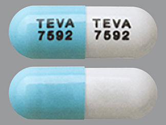 This is a Capsule imprinted with TEVA  7592 on the front, TEVA  7592 on the back.