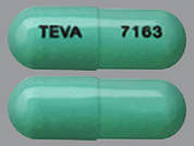 Tolterodine Tartrate Er: This is a light green oblong Capsule Er 24 Hr imprinted with TEVA on the front, 7163 on the back, and is manufactured by TEVA USA.