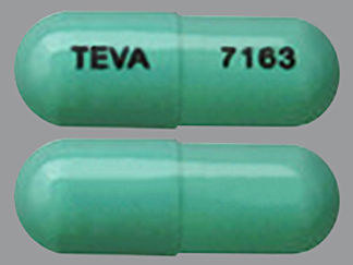 This is a Capsule Er 24 Hr imprinted with TEVA on the front, 7163 on the back.