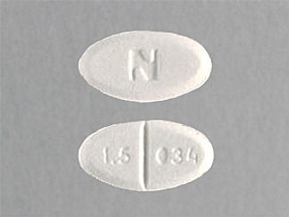 This is a Tablet imprinted with N on the front, 1.5 034 on the back.