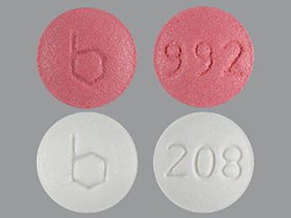This is a Tablet imprinted with b on the front, 992 or 208 on the back.