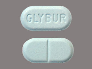 This is a Tablet imprinted with GLYBUR on the front, nothing on the back.